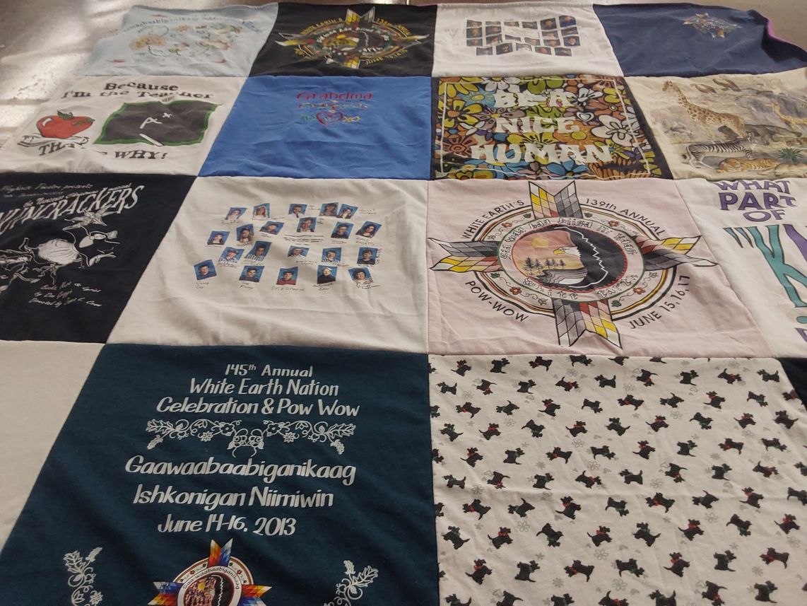 T-shirt quilt with native american culture, community events themes by Mary from IL