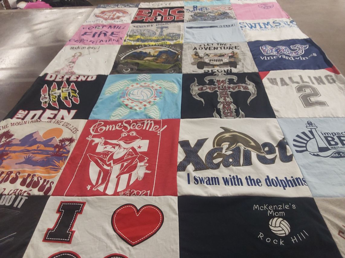 T-shirt quilt with swimming, travel themes by Michelle from SC