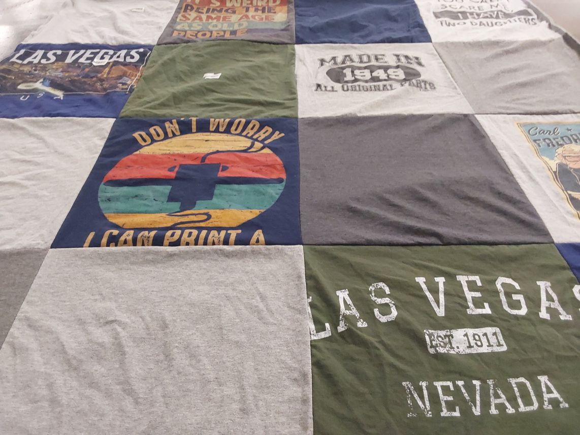 T-shirt quilt with travel, souvenirs themes by Amy from NV
