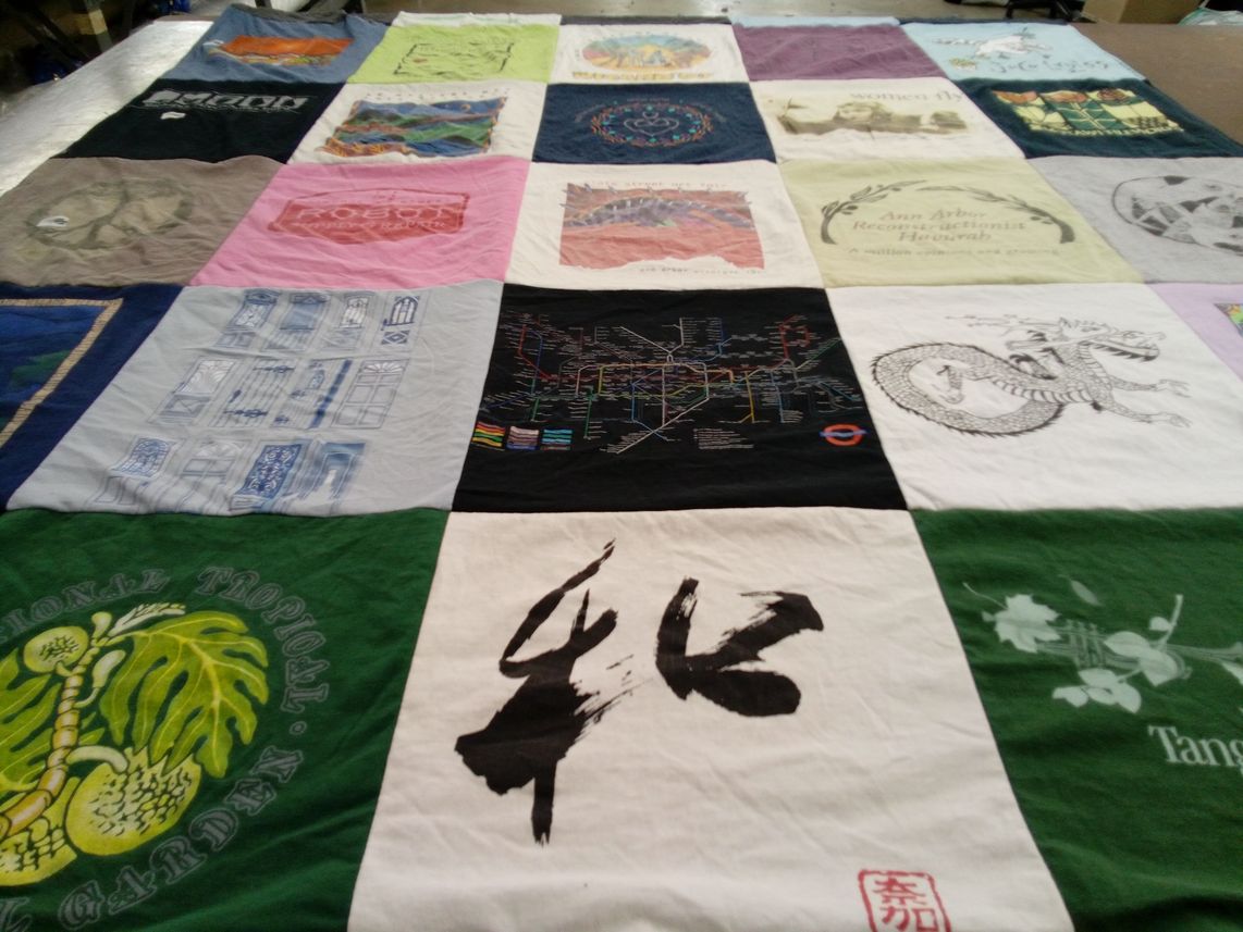 T-shirt quilt with art, cultural heritage themes by LEORA from MI