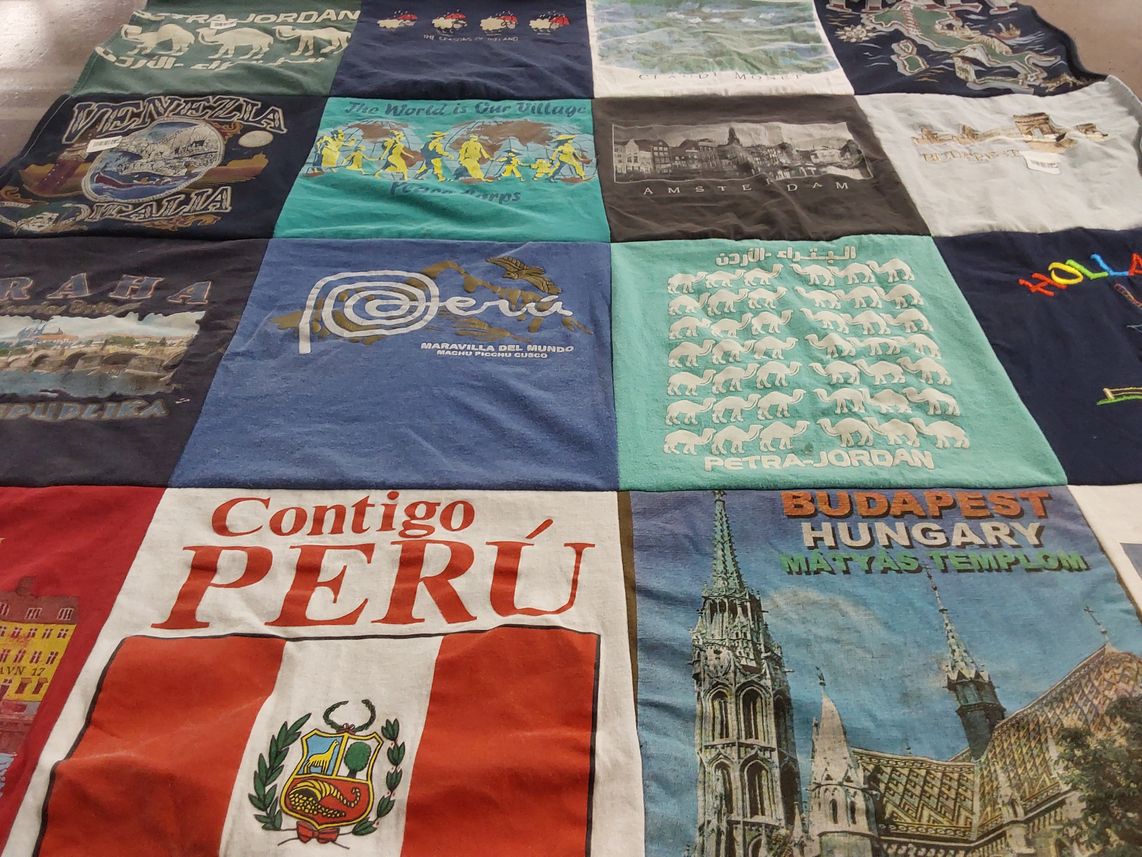 T-shirt quilt with travel, culture themes by Jeanne from CA