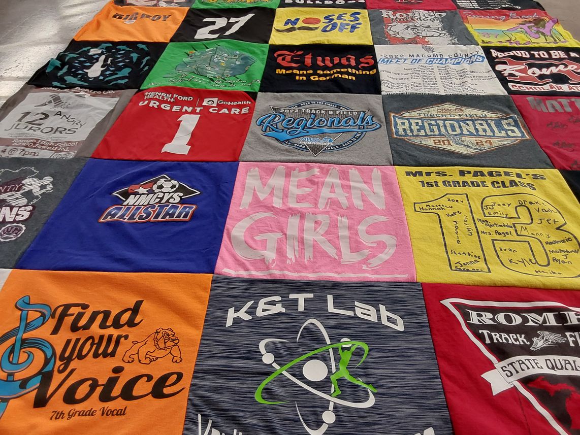 T-shirt quilt featuring track and field by Mary from MI