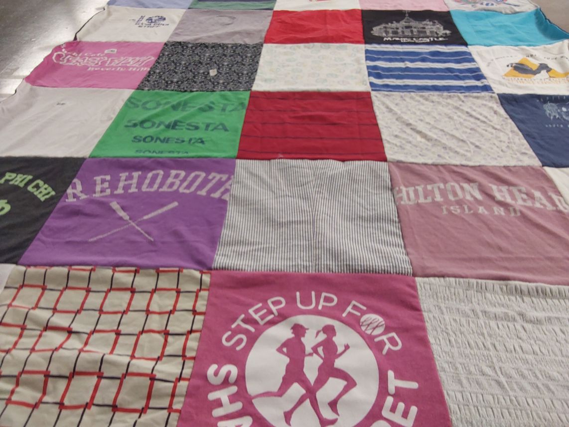 T-shirt quilt with running, beach themes by Deborah from FL
