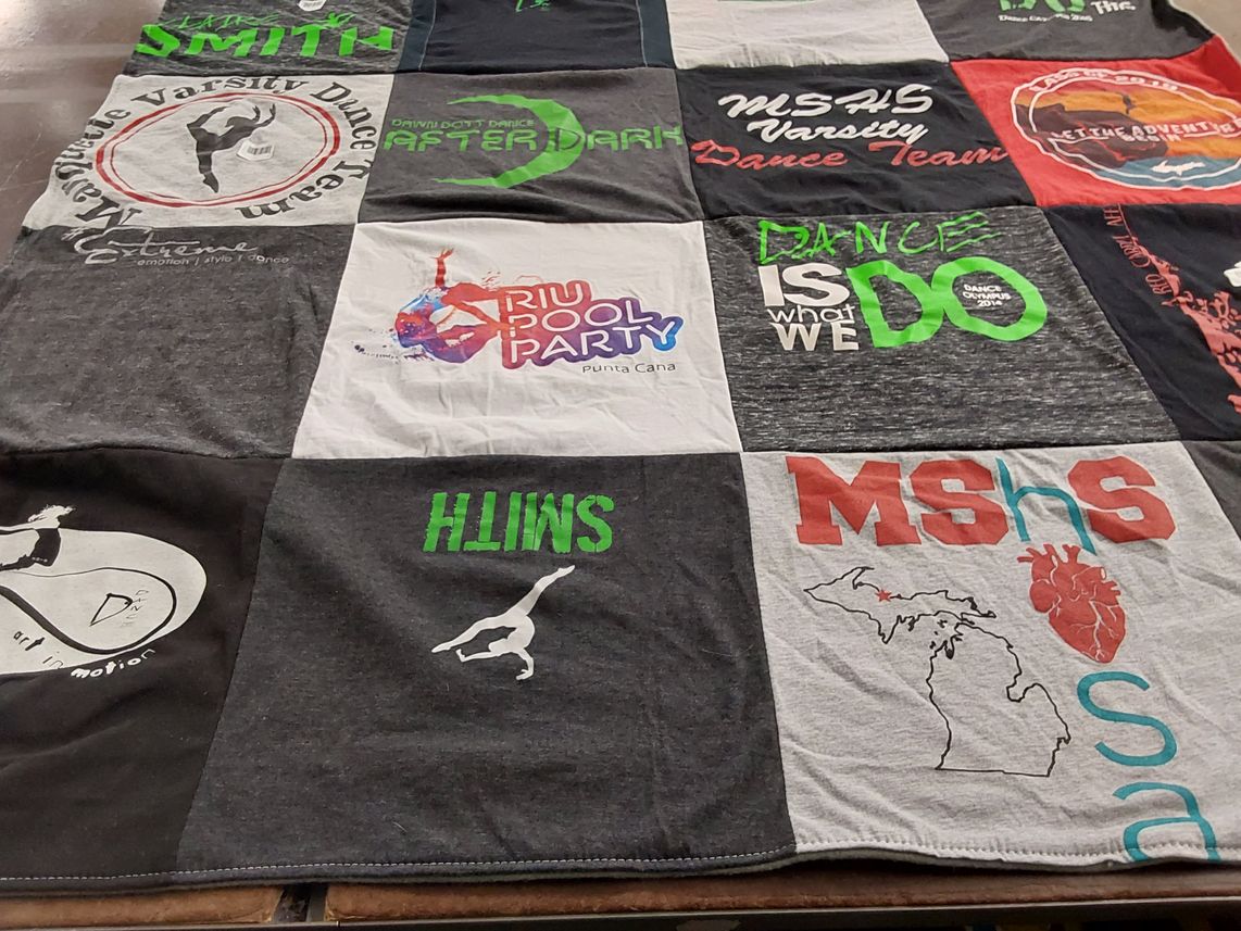 T-shirt quilt featuring michigan state high school varsity dance team by Kristen from MI