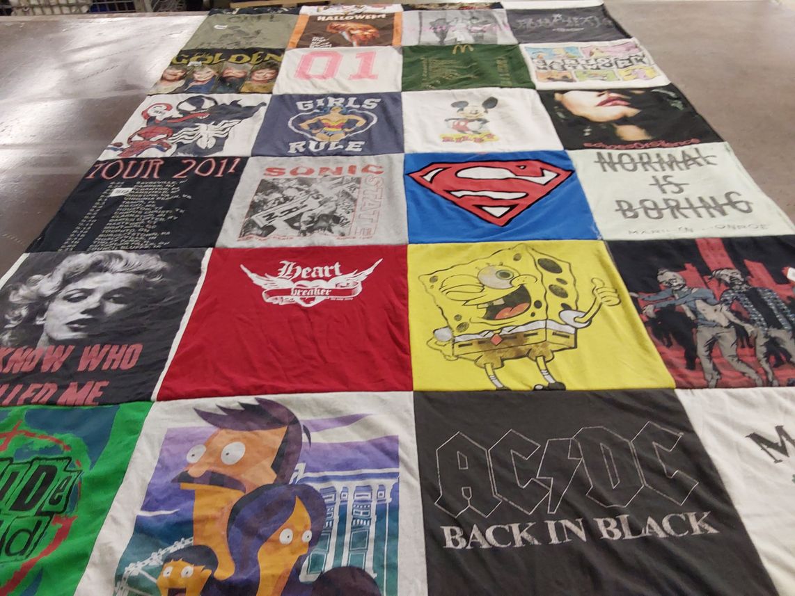 T-shirt quilt with music, pop culture themes by Michelle from TN