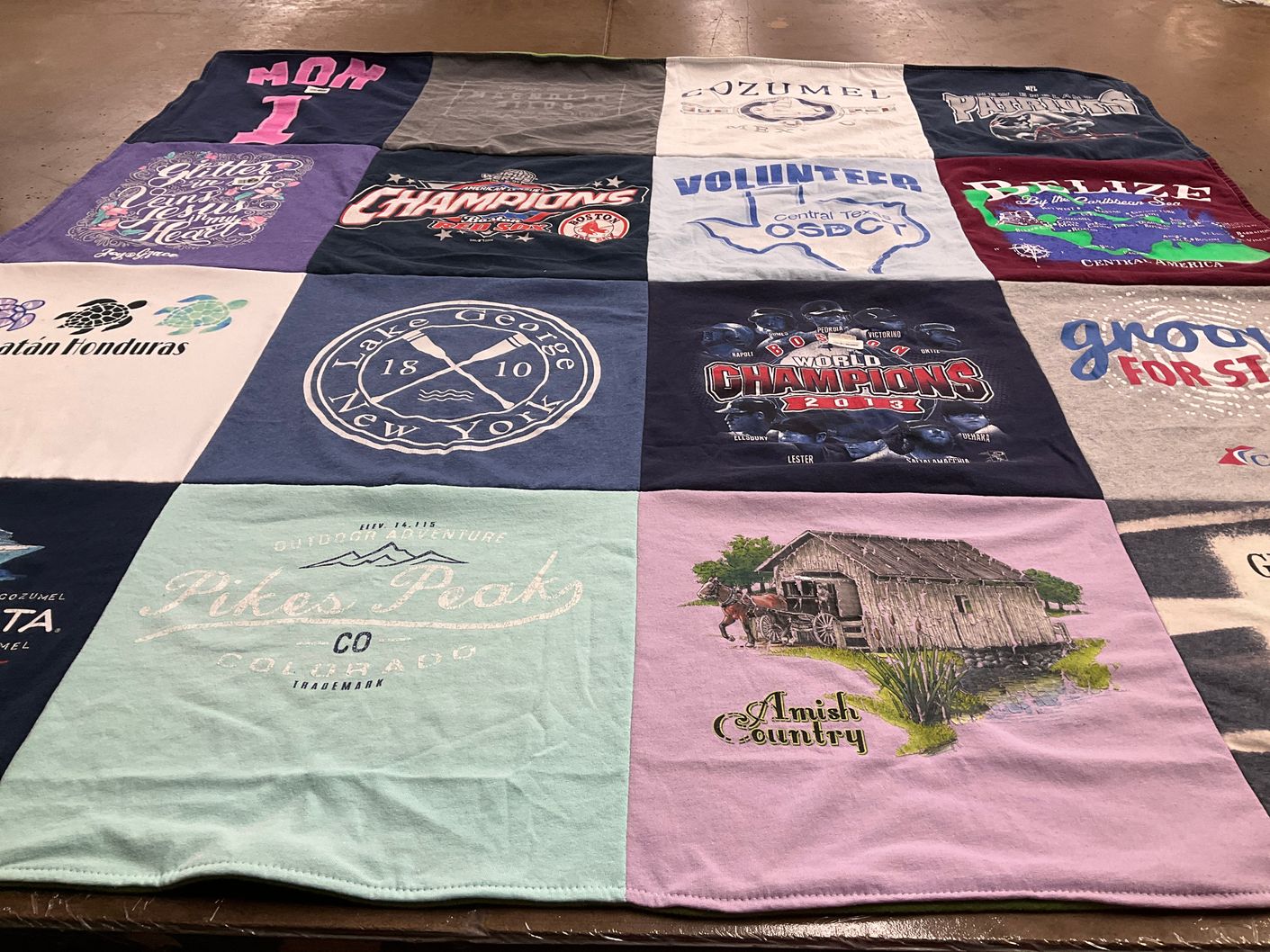 T-shirt quilt with outdoor adventure, travel themes by Katarina from TX
