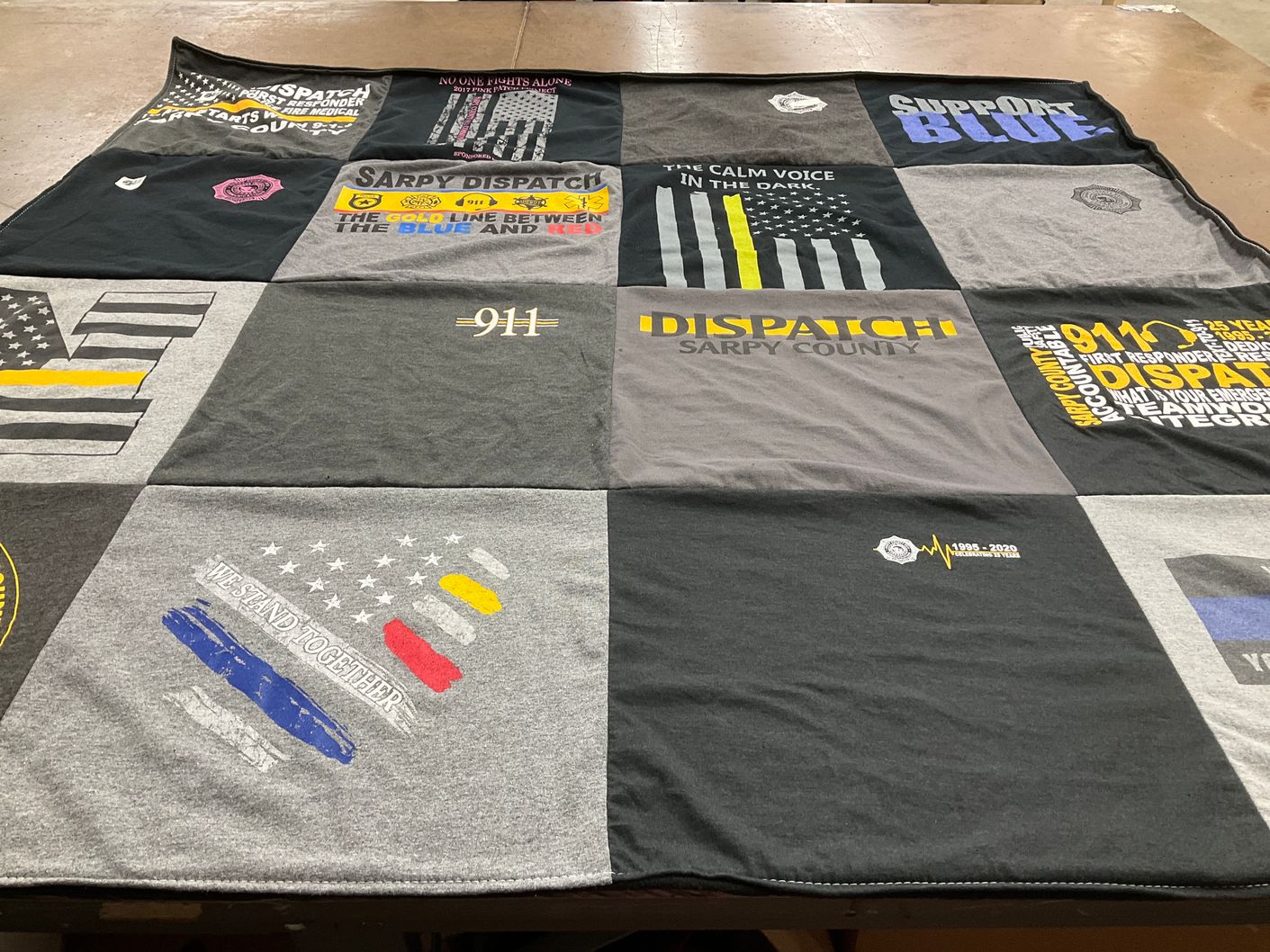 T-shirt quilt with police, emergency services themes by Kristy from NE