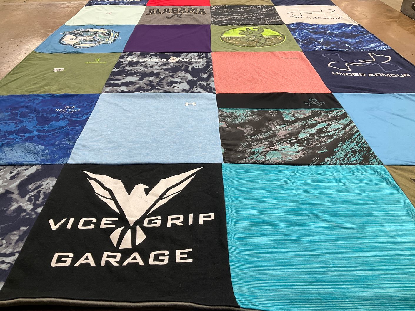 T-shirt quilt with hunting, fishing themes by Crystal from KY