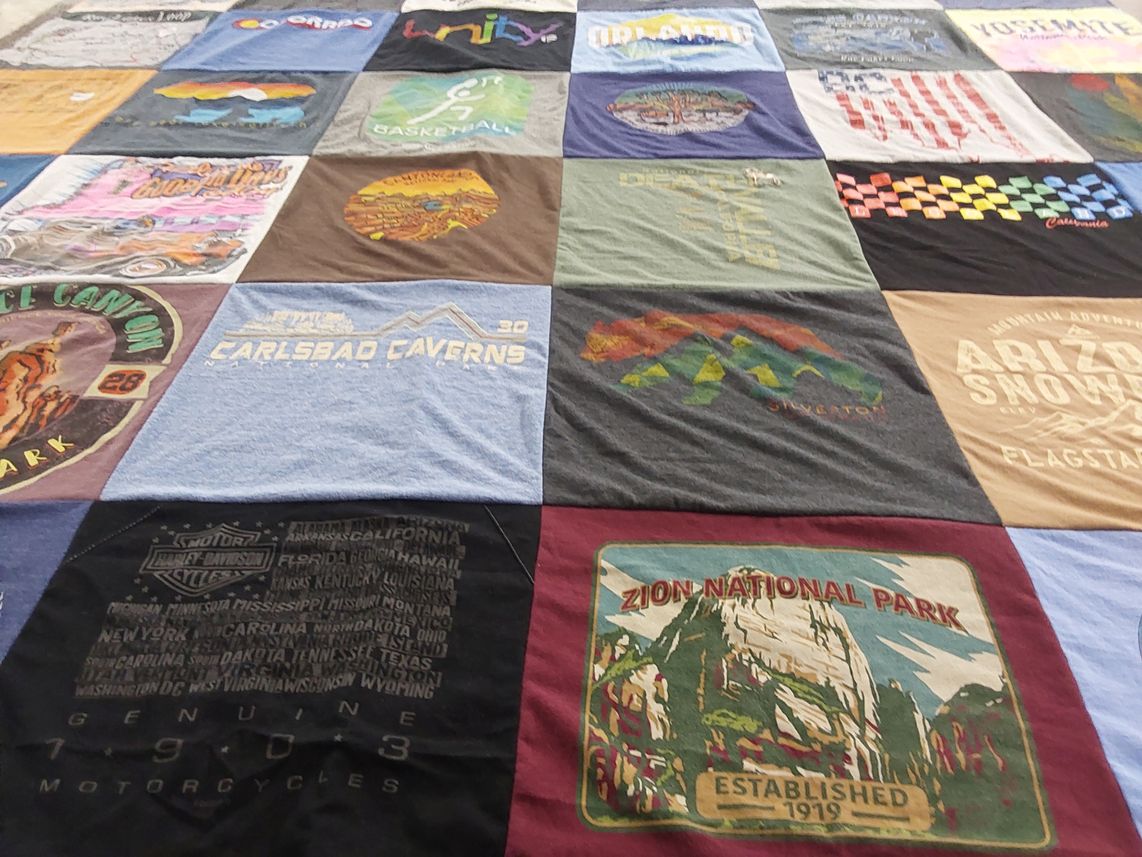 T-shirt quilt with national parks, outdoor activities themes by Deborah from AZ