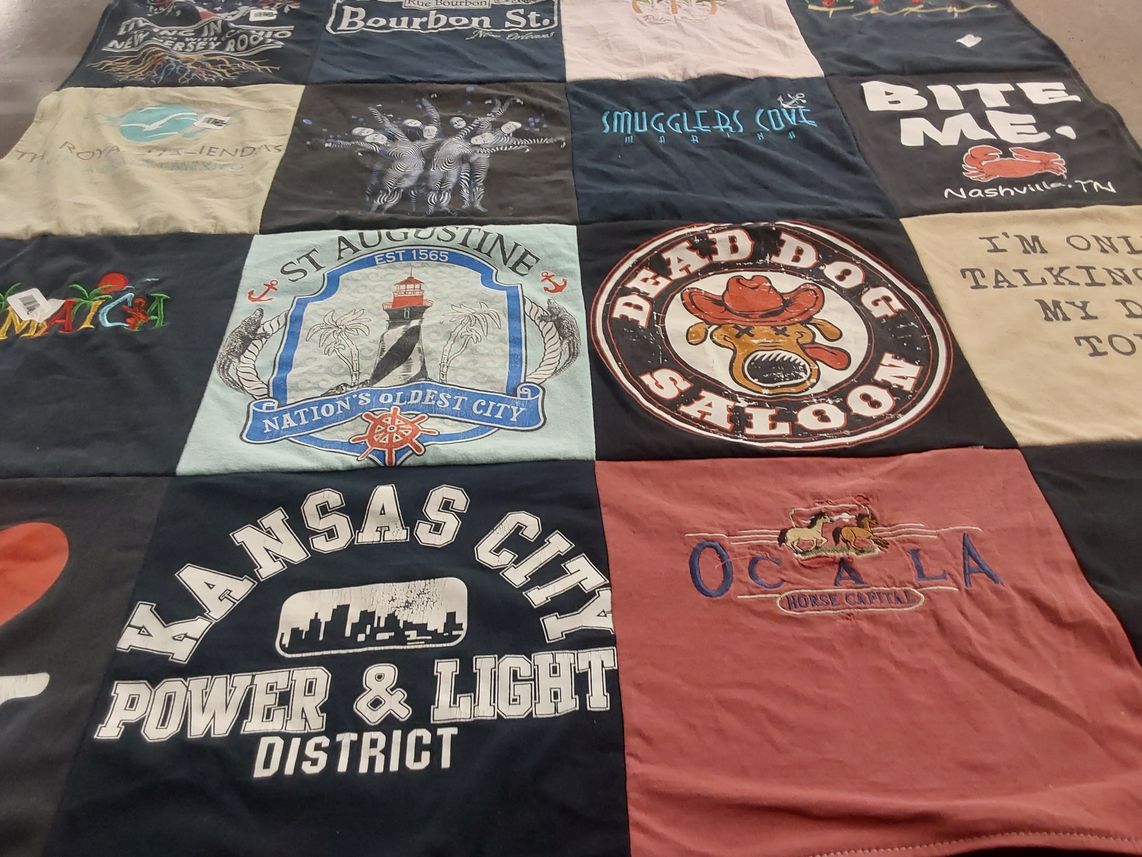 T-shirt quilt with travel, food themes by Deby from OH