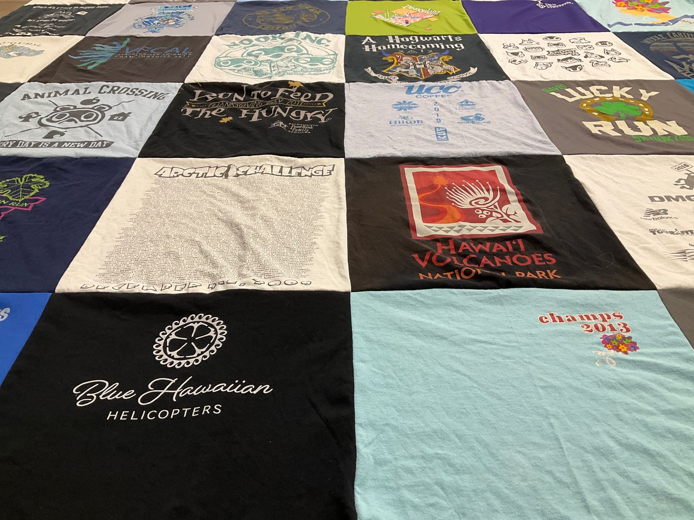 T-shirt quilt with gaming, travel themes by Shelly from CA
