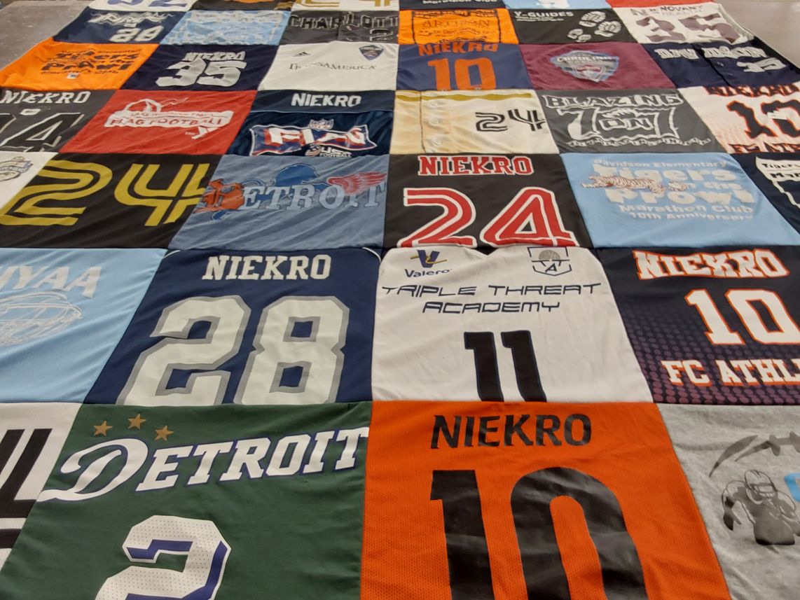 T-shirt quilt with sports, football themes by Catherine from NC