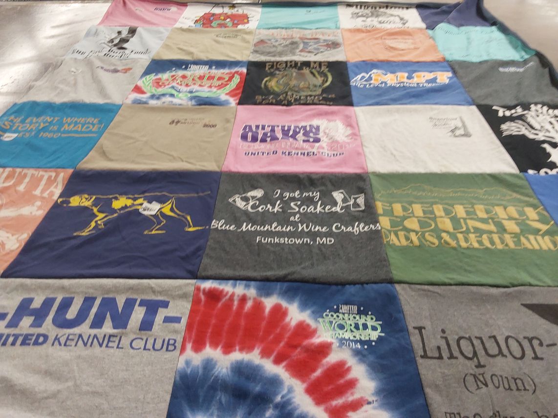 T-shirt quilt with hunting, dog training themes by Lavena from PA