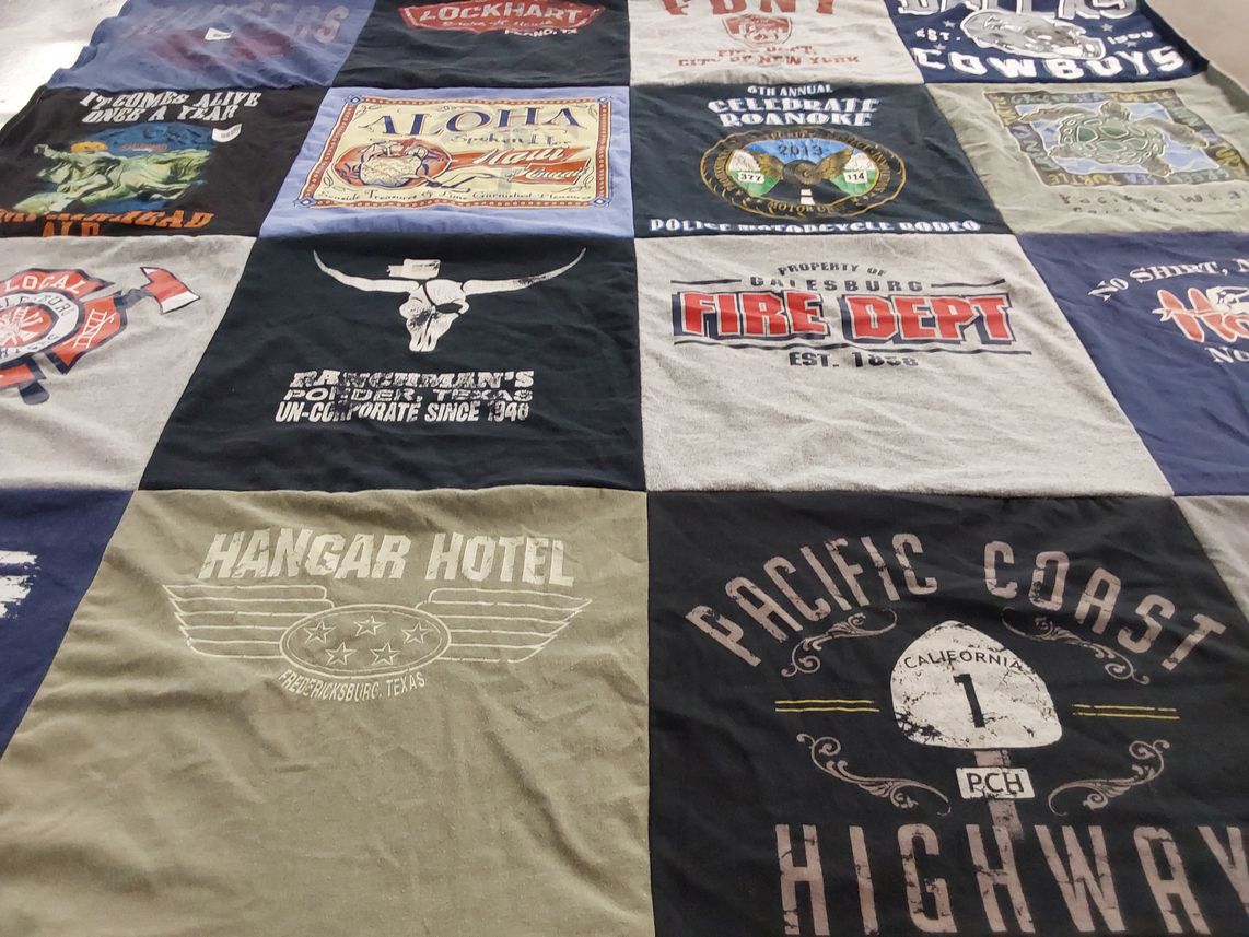 T-shirt quilt with motor sports, firefighting themes by Linda from TX