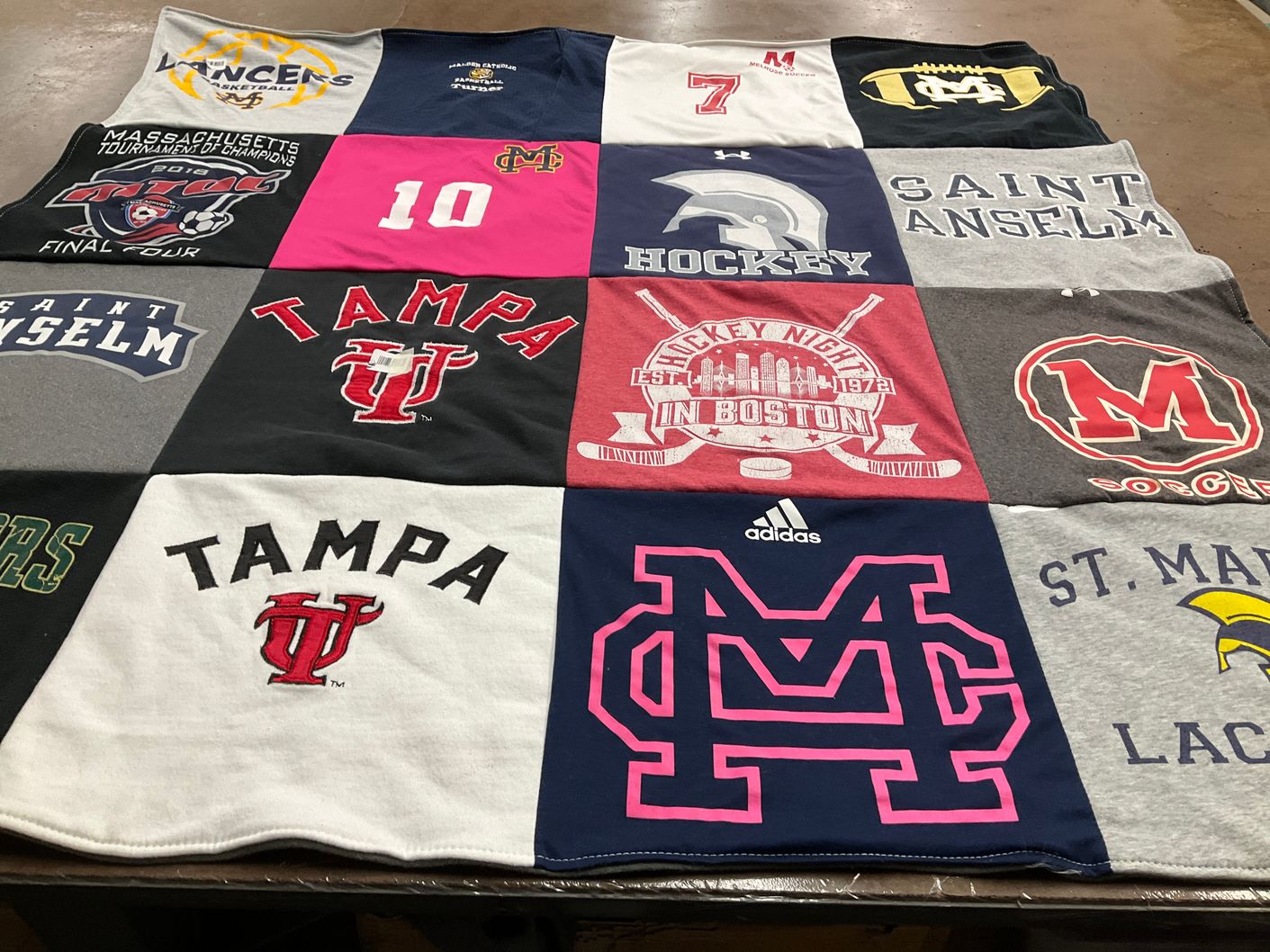 T-shirt quilt featuring tampa university, saint anselm college by shelby from MA