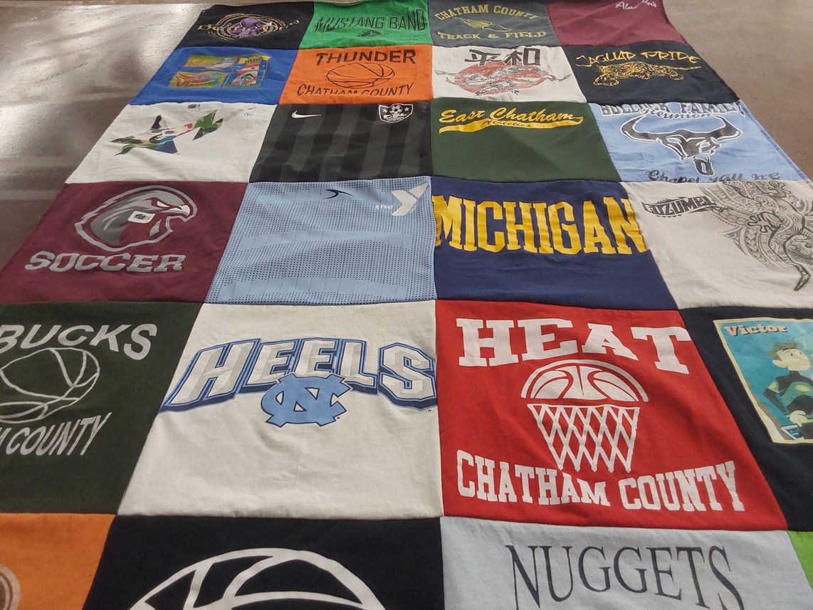 T-shirt quilt featuring university of north carolina heels, chatham county thunder by Ann from NC