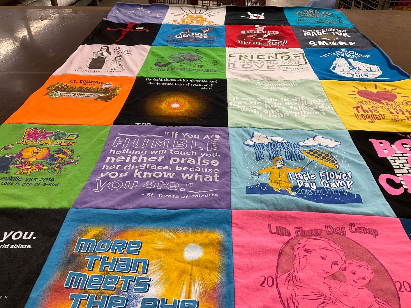 T-shirt quilt from st columbille school by Laura from NE