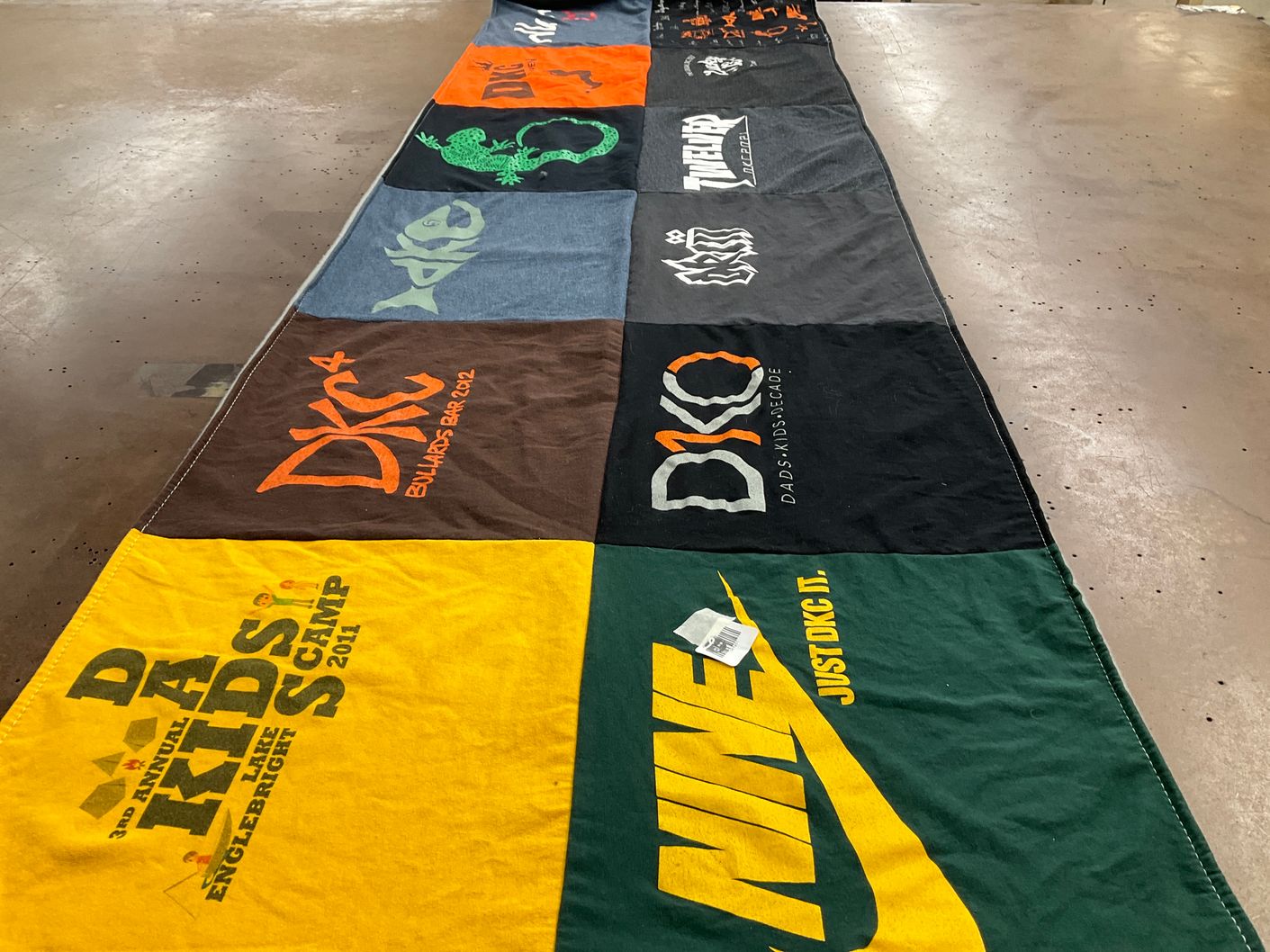 T-shirt quilt with camping, family themes by Marley from CA