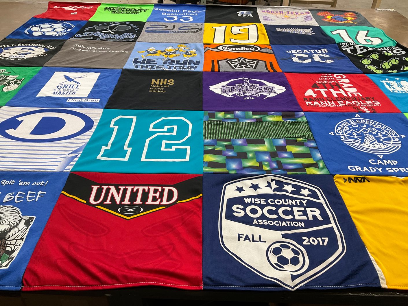 T-shirt quilt featuring wise county soccer association by Cathy from TX