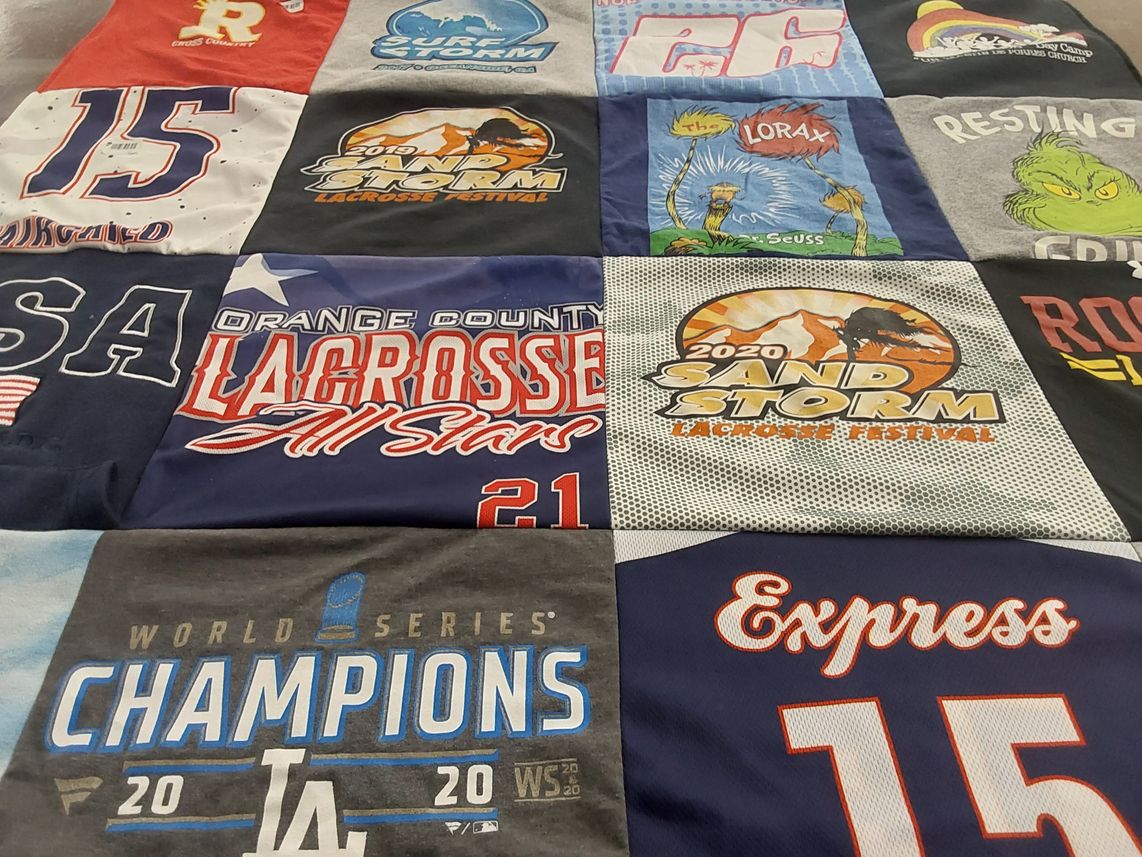 T-shirt quilt with lacrosse, sports themes by Janene from CA