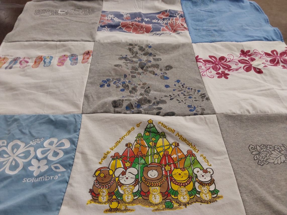 T-shirt quilt with floral designs, tropical themes themes by Laurie Ann from CA