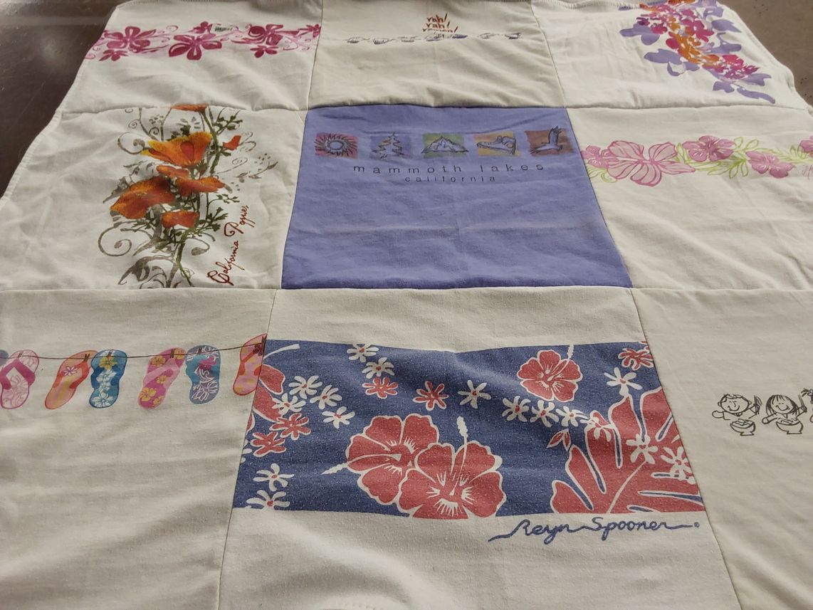 T-shirt quilt with travel, nature themes by Laurie Ann from CA