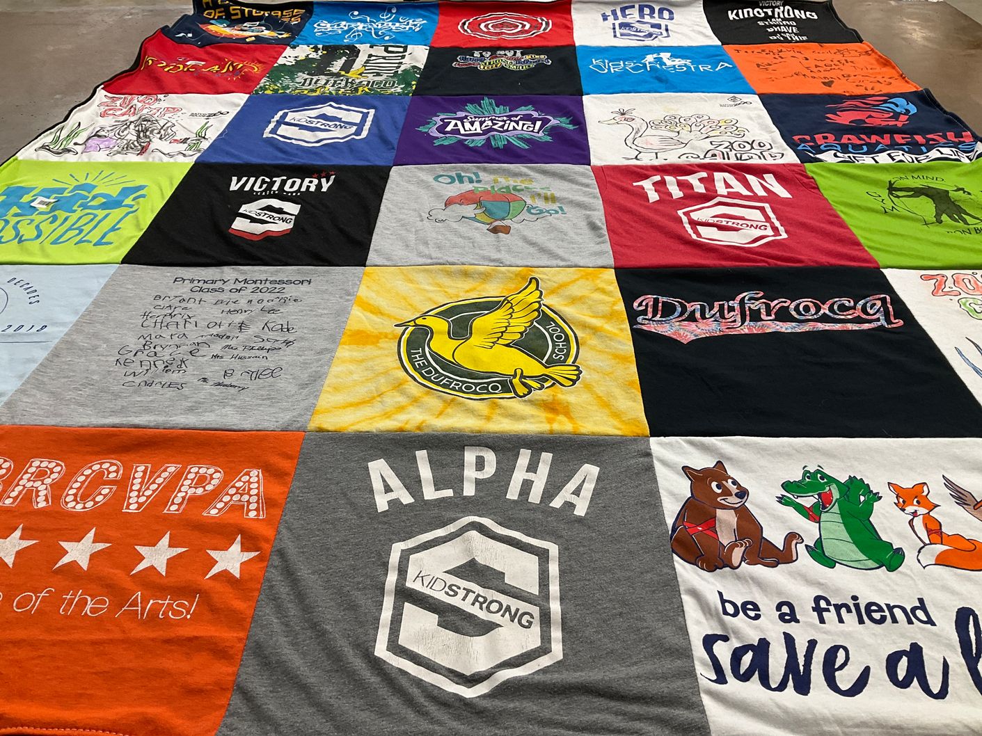T-shirt quilt from primary montessori school by Mary from LA
