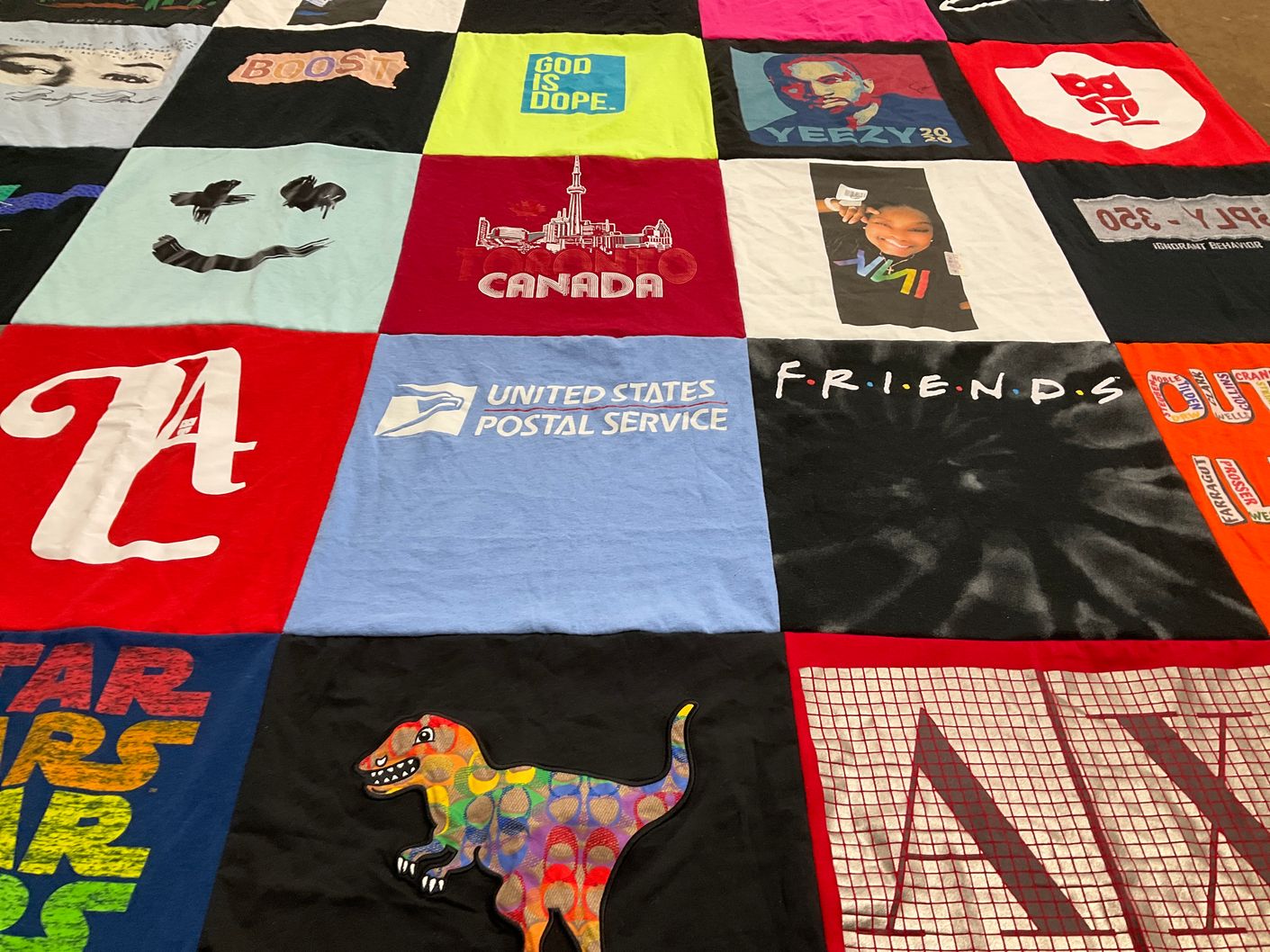 T-shirt quilt with pop culture, media themes by Nikki from IL