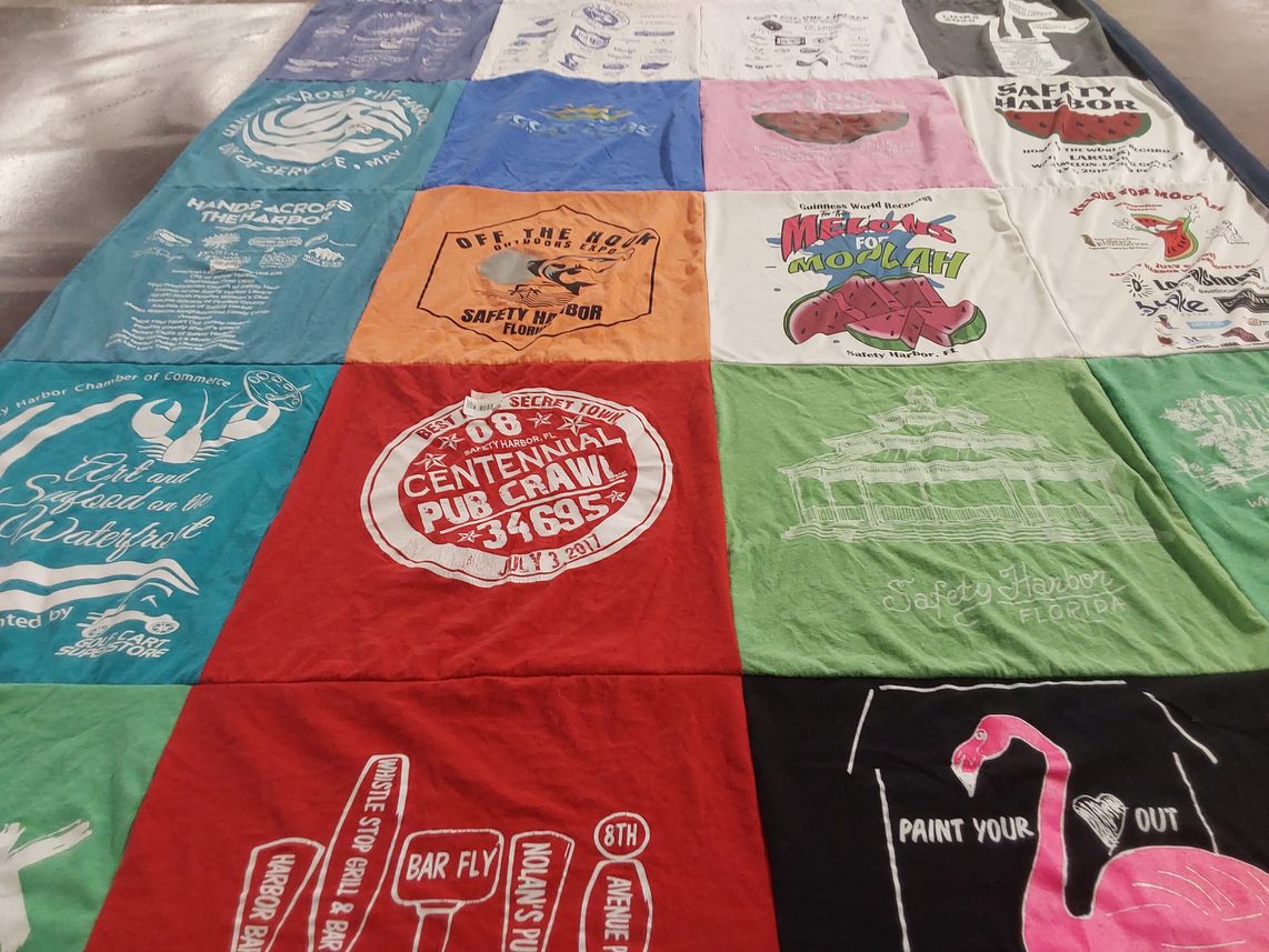 T-shirt quilt with food, water activities themes by Scott from FL