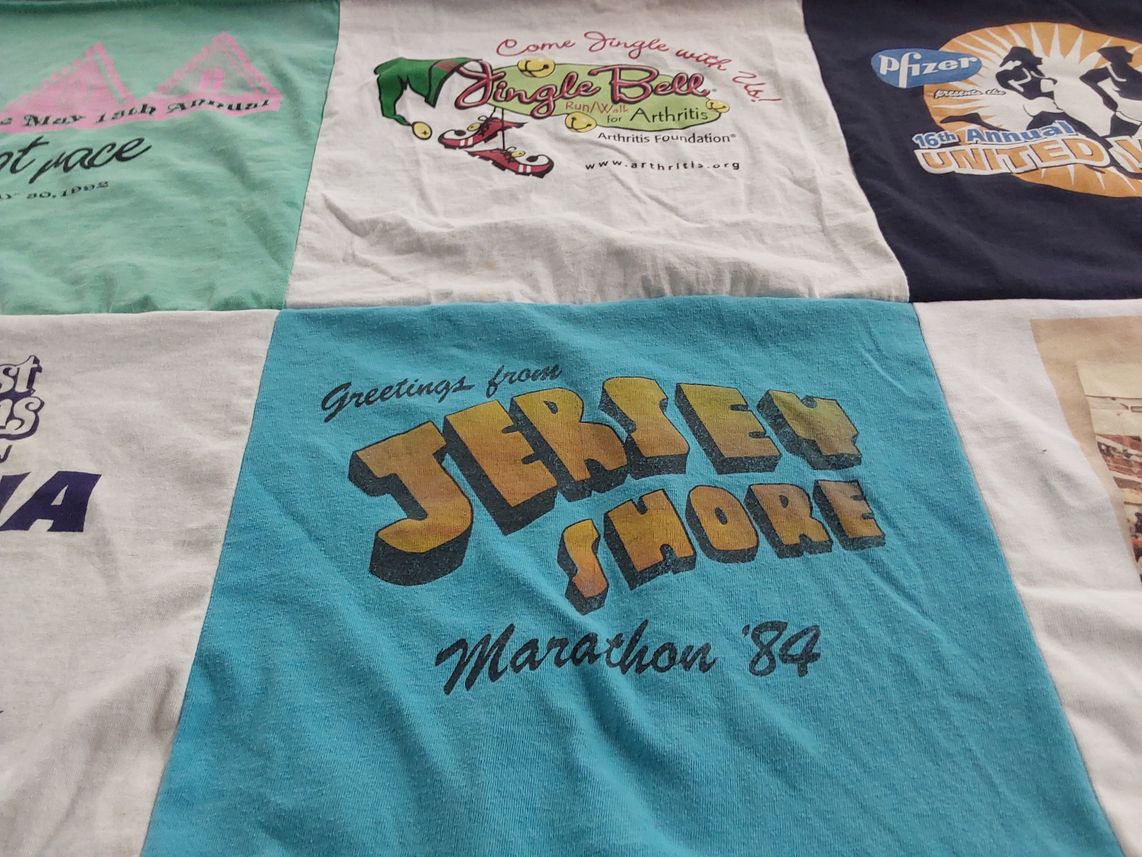 T-shirt quilt with running, marathons themes by Joan from NJ