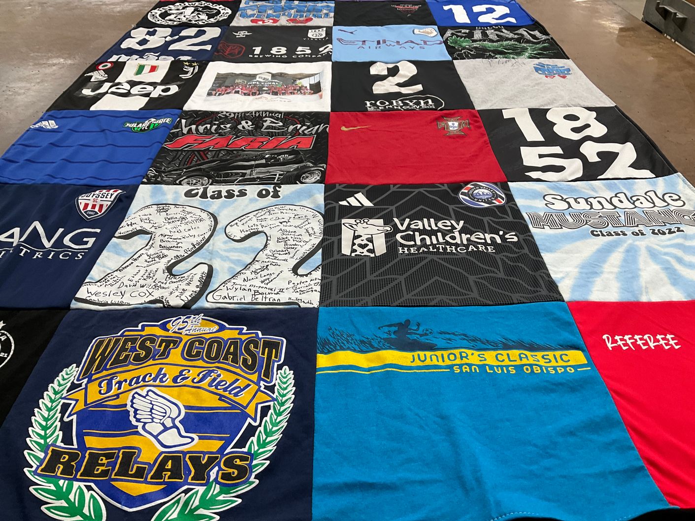 T-shirt quilt featuring west coast track and field by Deanne from CA