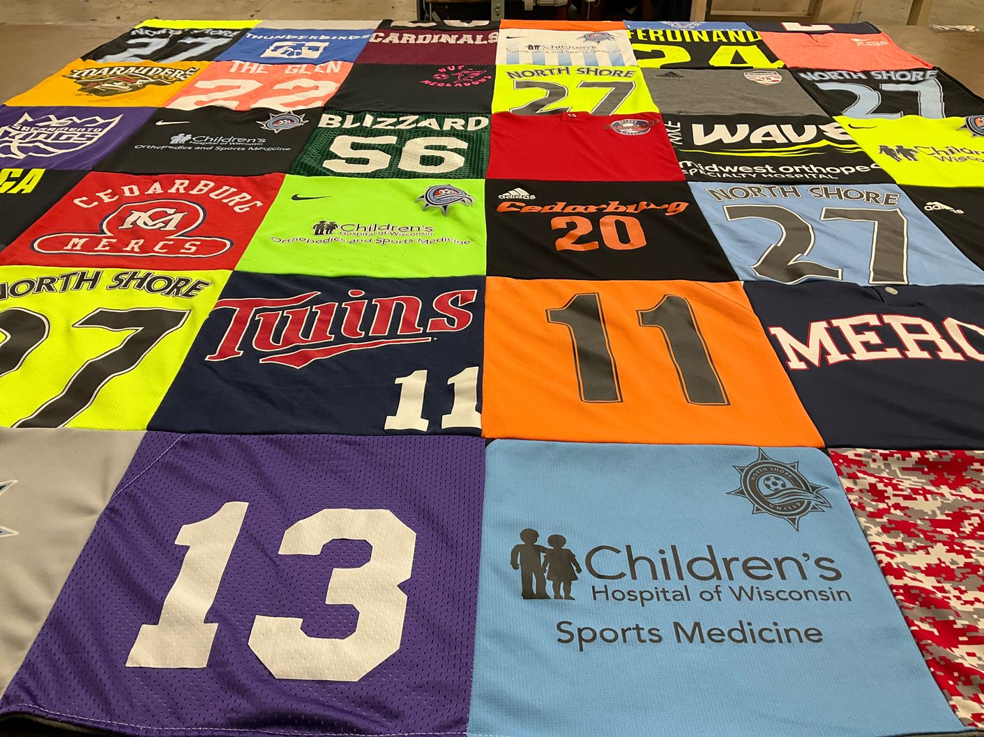 T-shirt quilt featuring north shore soccer club by Susan from WI