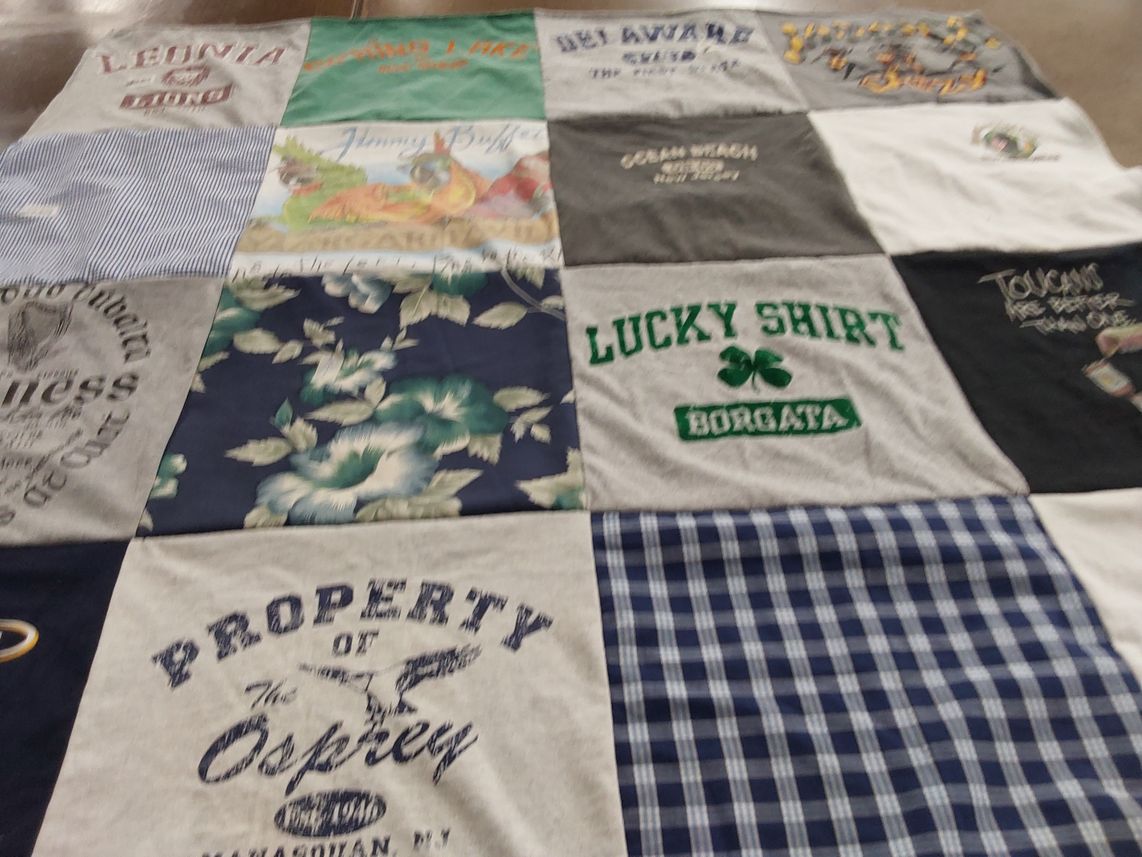 T-shirt quilt with gambling, travel themes by Gail from NJ