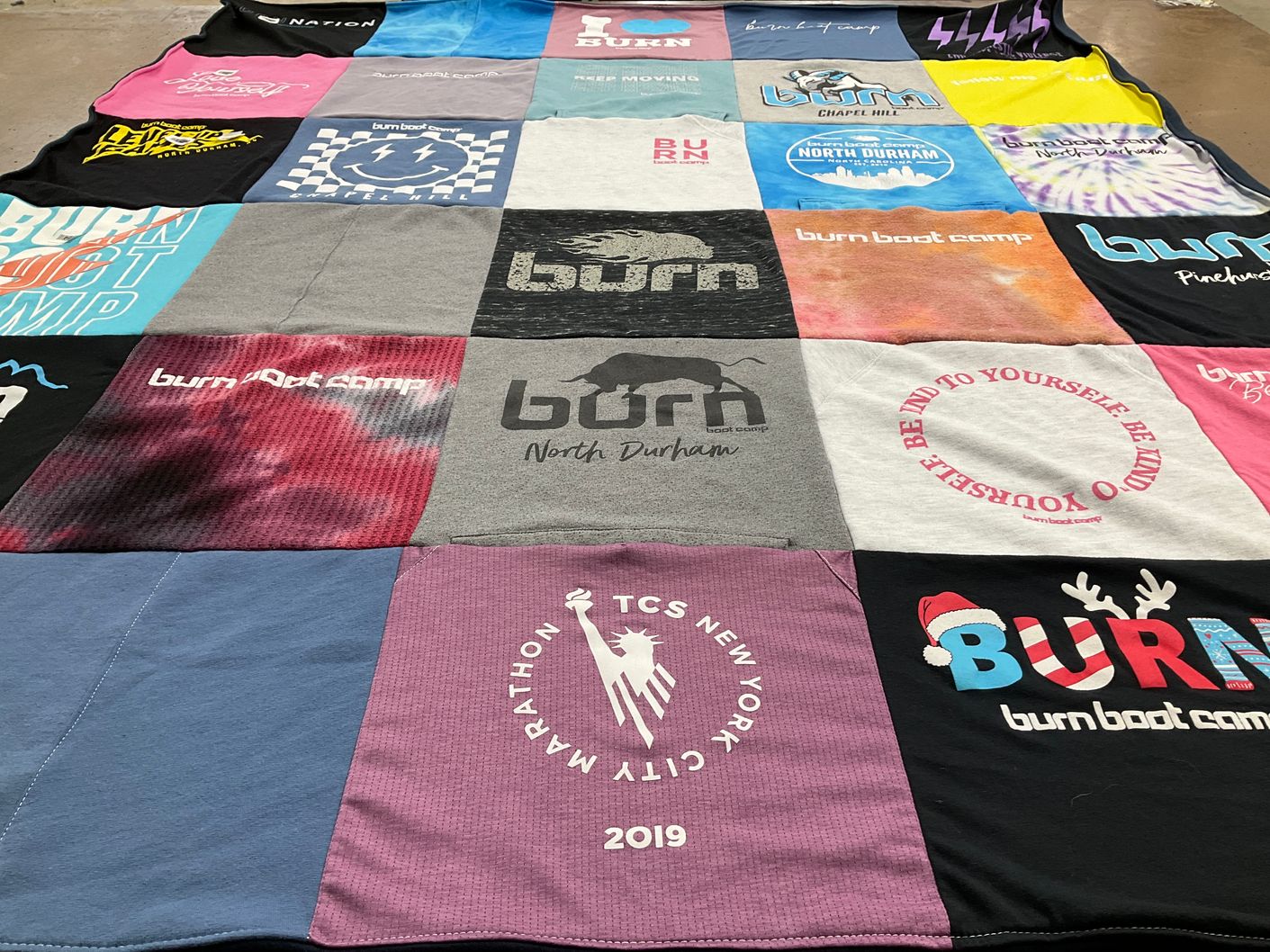 T-shirt quilt with fitness, exercise themes by Robin from NC