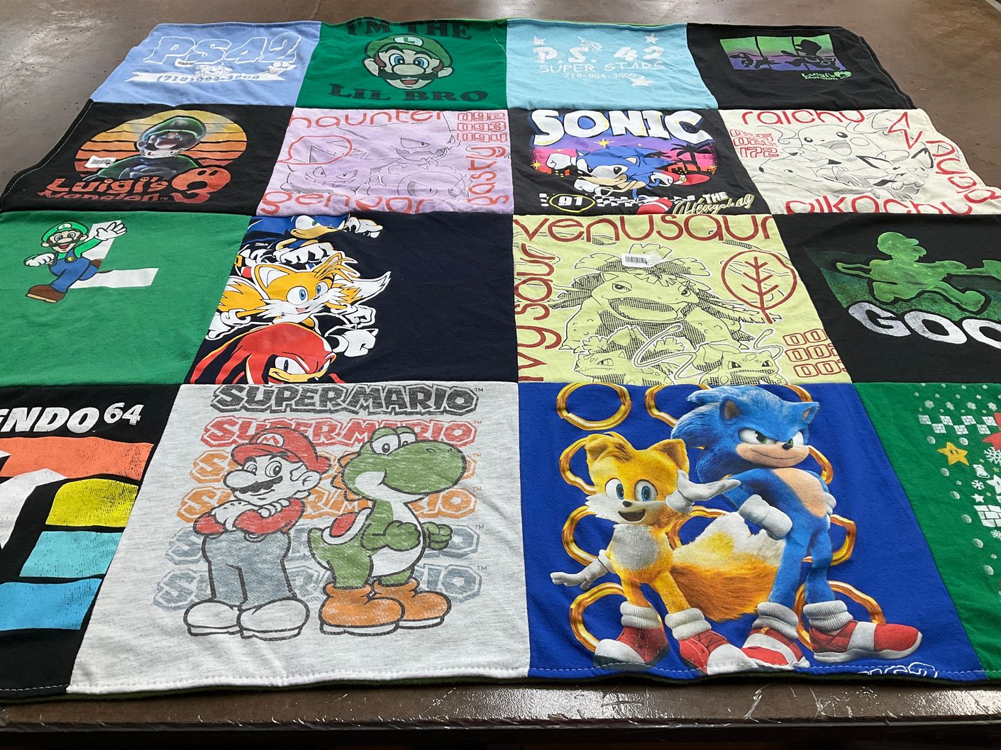 T-shirt quilt with video games, pokemon themes by Jennifer from NC