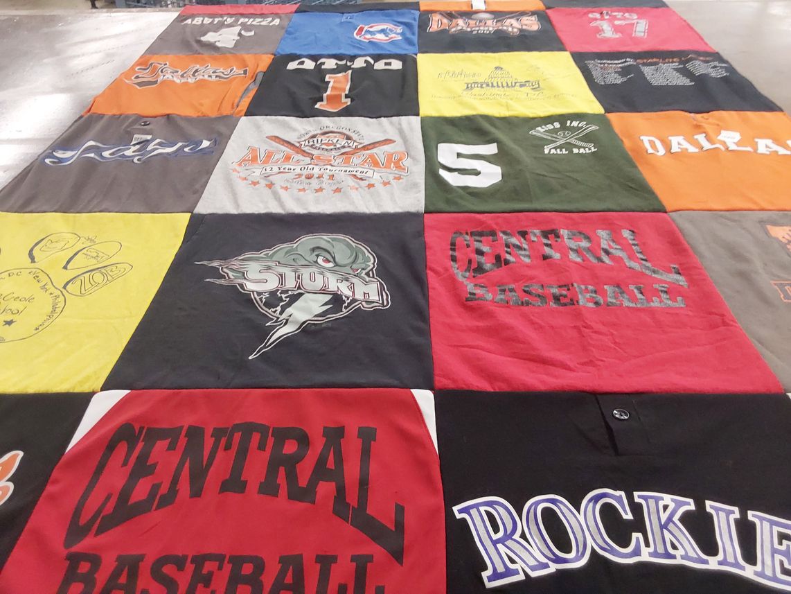 T-shirt quilt featuring central baseball by Laura from OR