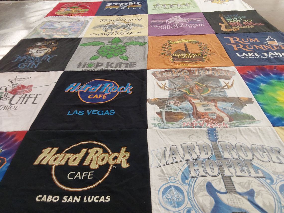 T-shirt quilt with music, food themes by Judith from CA