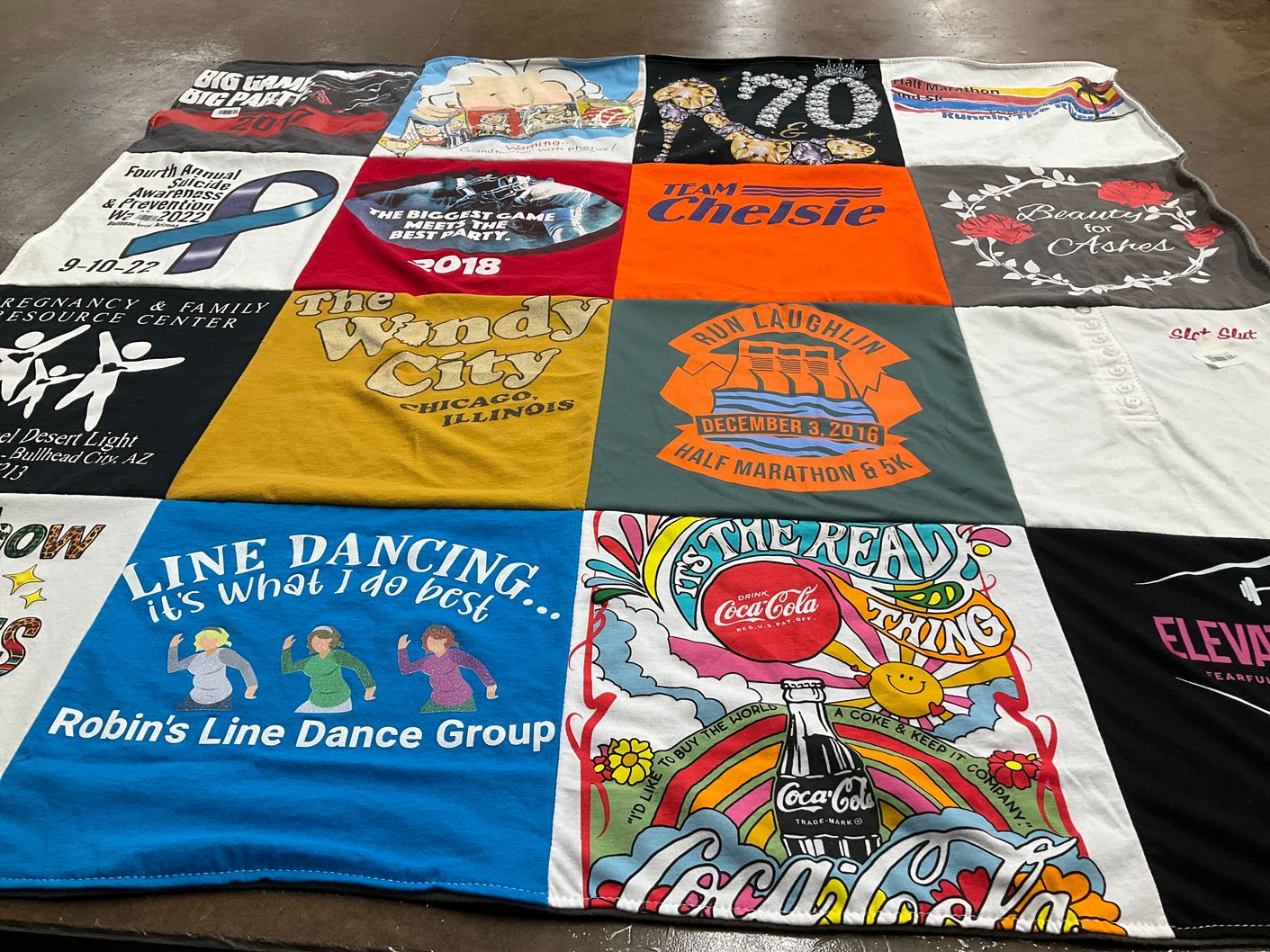 T-shirt quilt with line dancing, running themes by Sandi from CA
