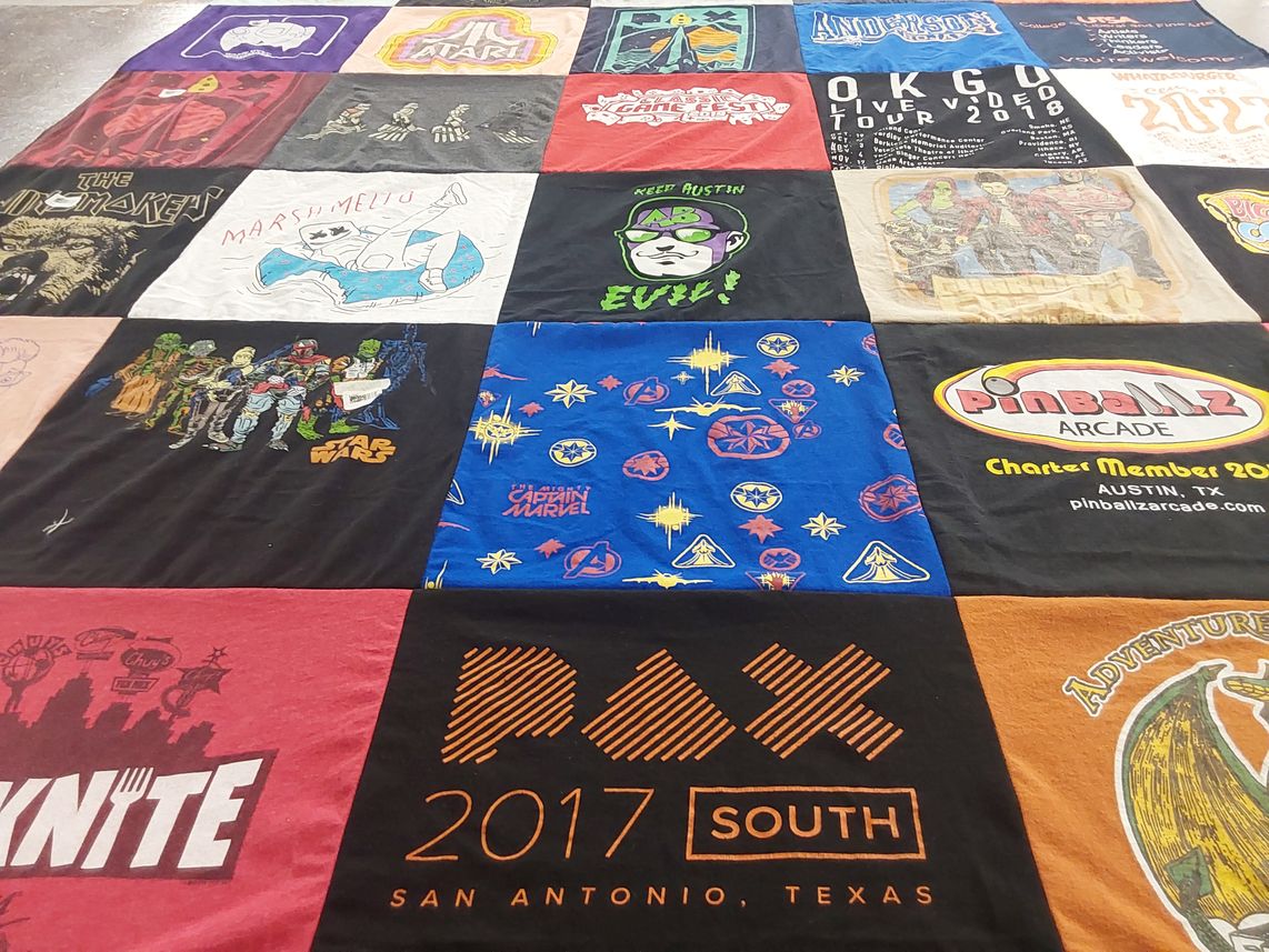 T-shirt quilt with music, gaming themes by Cheryl from TX