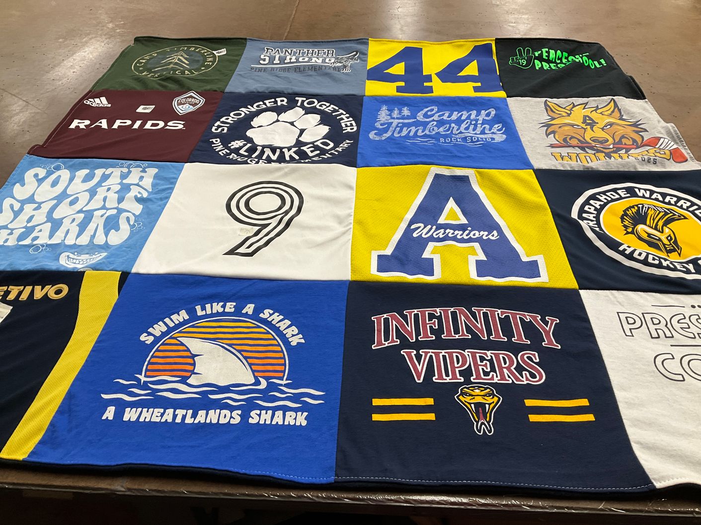 T-shirt quilt featuring south shore sharks, infinity vipers by RENATA from CO