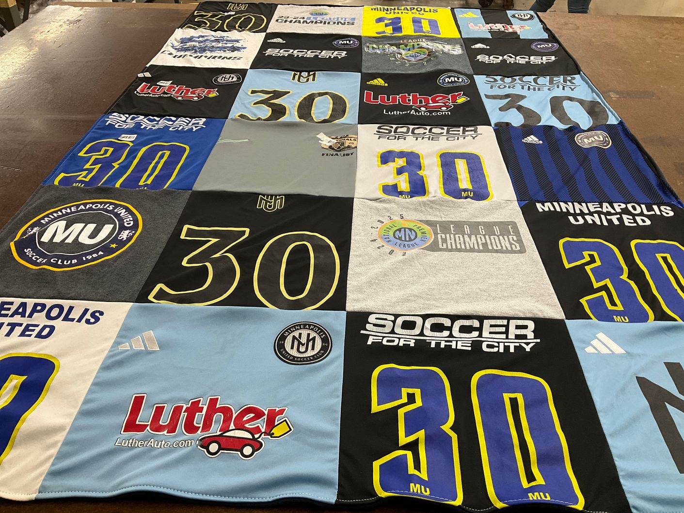 T-shirt quilt featuring minneapolis united by Anne from MN