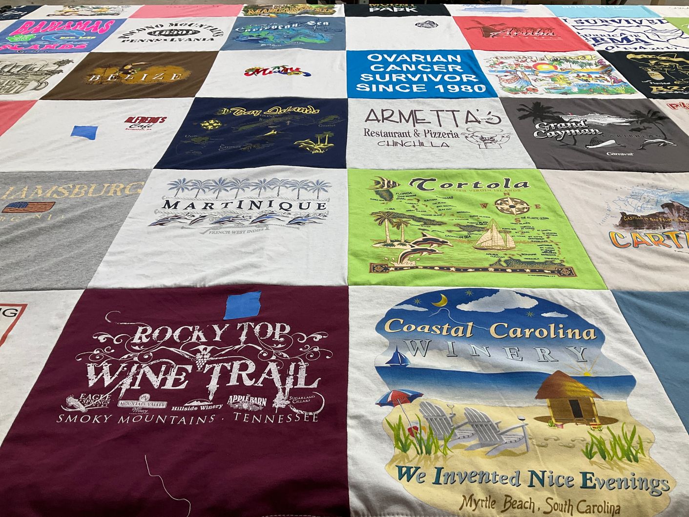 T-shirt quilt with travel, cancer awareness themes by Lauren from FL
