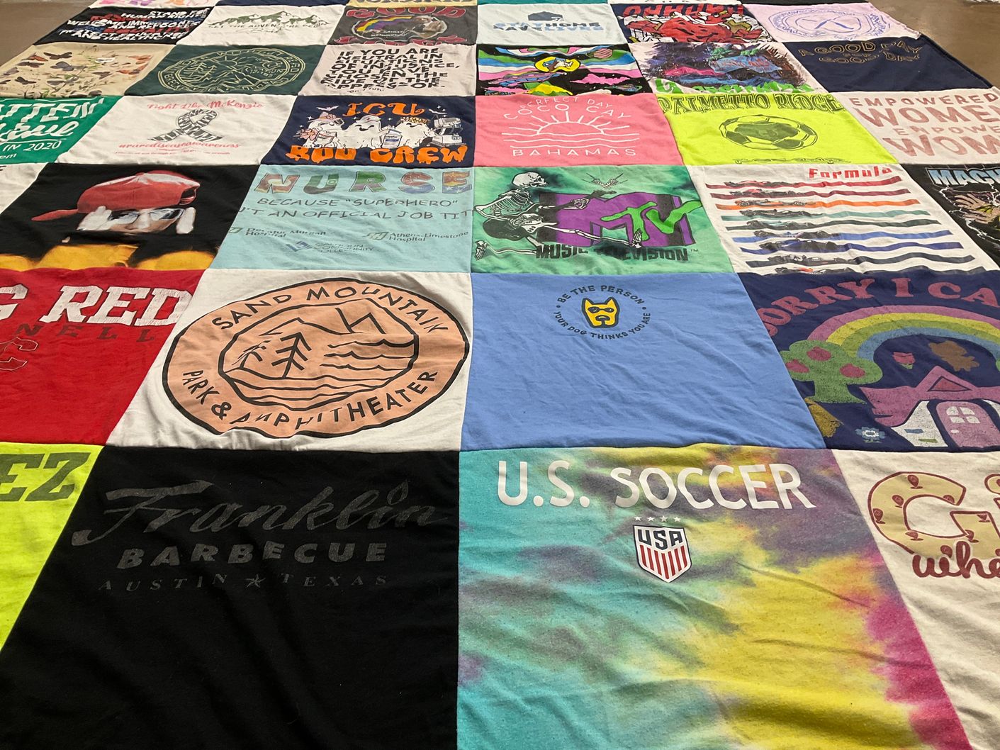 T-shirt quilt with music, sports themes by Olivia from AL