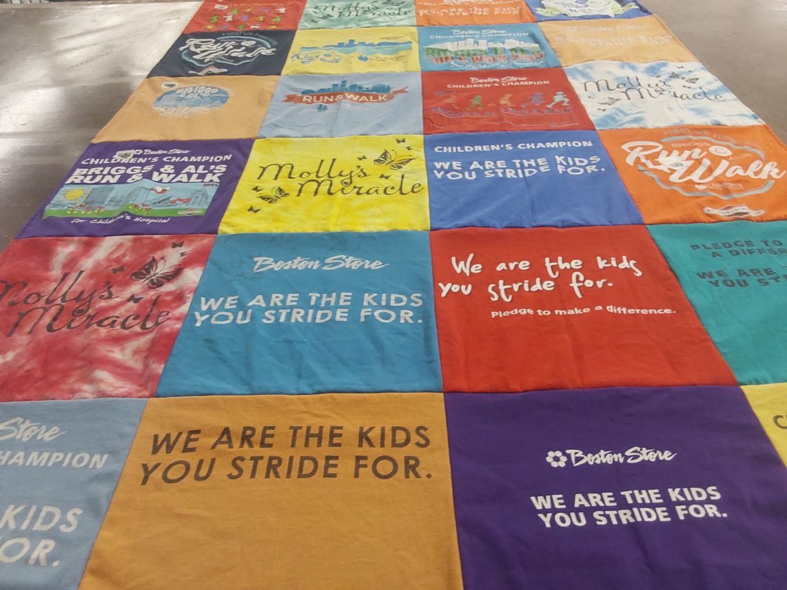 T-shirt quilt with charity, running themes by Molly from WI