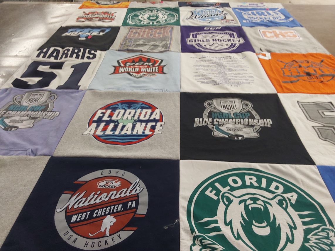 T-shirt quilt with hockey, sports themes by Jodi from FL