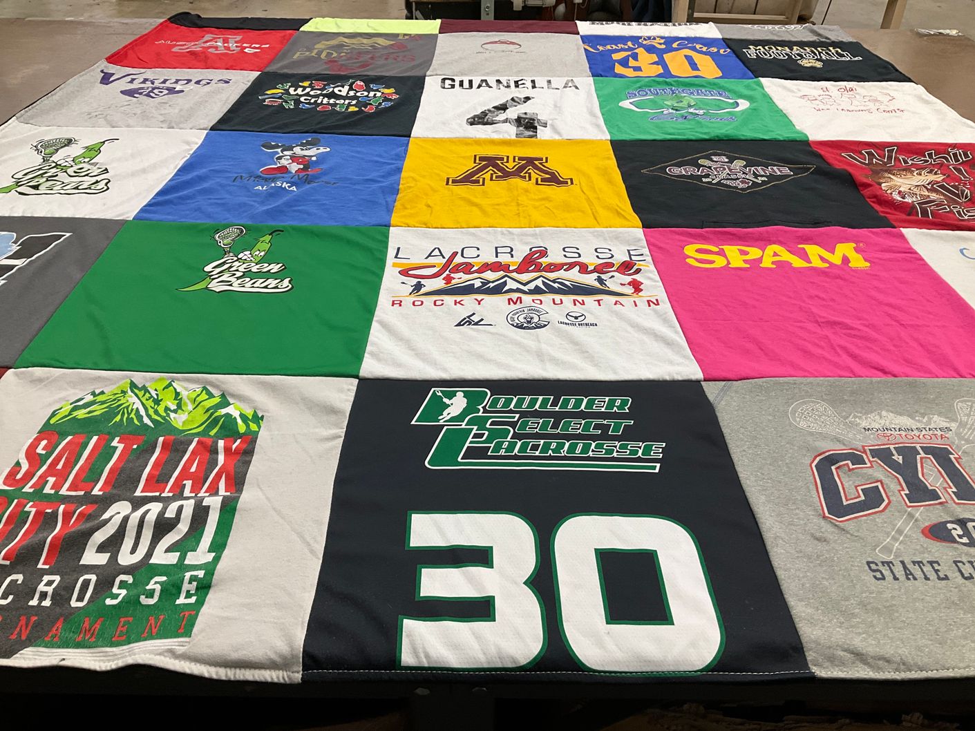 T-shirt quilt with lacrosse, sports themes by Darci from CO