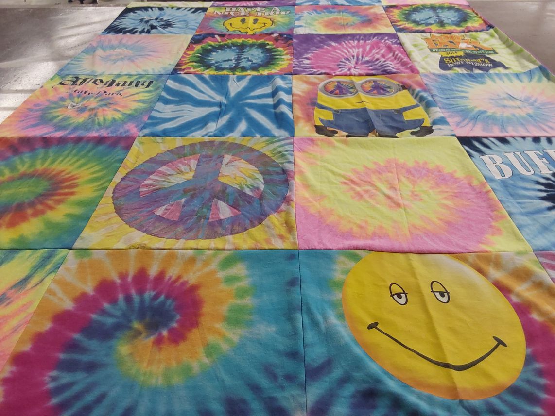 T-shirt quilt with tie dye, pop culture themes by Rita from NY
