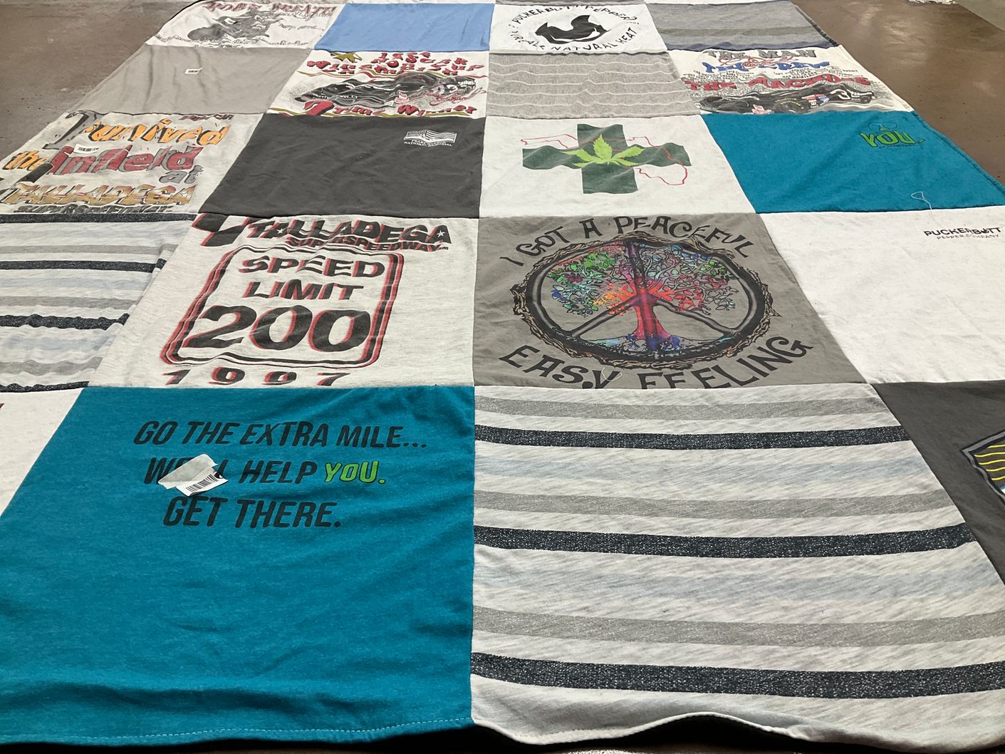 T-shirt quilt with racing, motorsports themes by Barbara from FL
