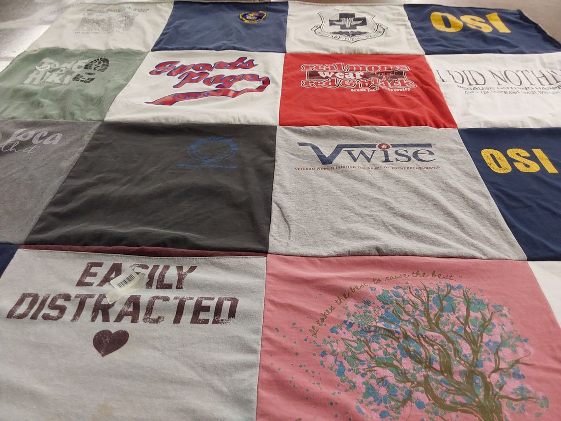 T-shirt quilt with entrepreneurship, veteran support themes by lawana from TX
