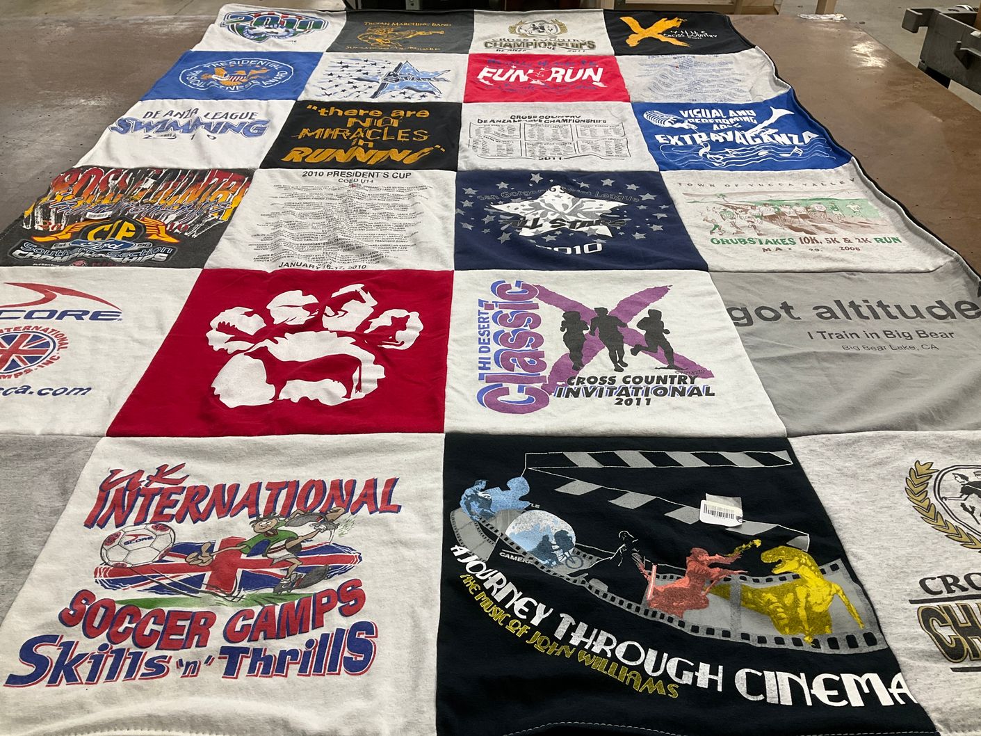 T-shirt quilt with running, soccer themes by Kristina from MA